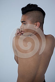Rear view of sensuous transgender