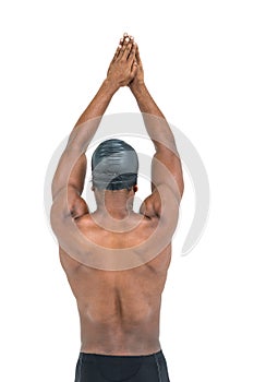 Rear view of swimmer ready to dive