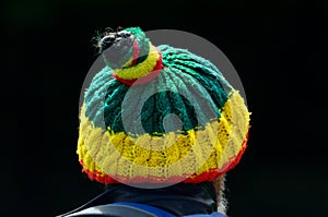 Man wearing a Bob marley hat photo
