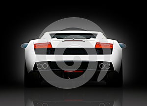 Rear view of white supercar photo