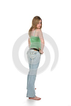 Rear view of woman in faded blue jeans