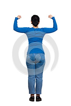 Rear view woman full body showing and flexing arm muscles, looking confident. Brave girl inner strength and power gesture isolated