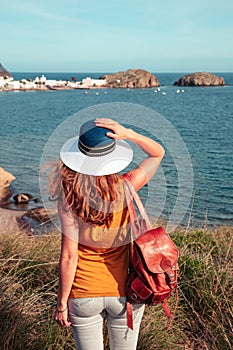 Rear view of woman looking at the sea