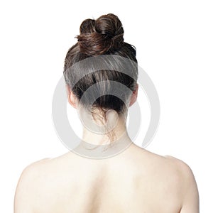 Rear view of woman with messy bun hair style