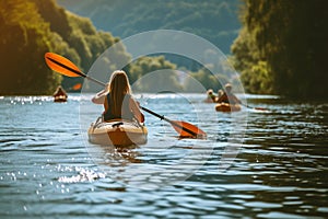 Rear view of woman paddles her kayak