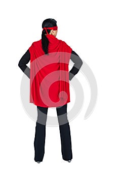 Rear view of woman pretending to be a super hero