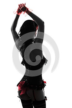 Rear view woman stripper showgirl silhouette photo