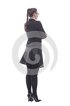 Rear view. young business woman looking at a white blank screen.