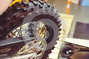 Rear wheel of motorcycle, studded tire and chain