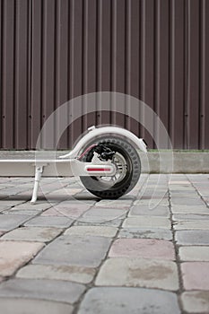 The rear wheel of the scooter. Electric scooter. Transport. New technologies