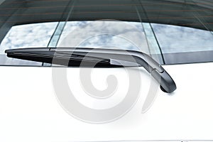 Rear windshield wiper blade on glass