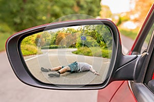 Rearview mirror with a man hit by a car