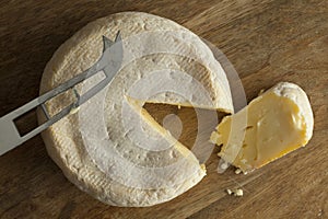 Reblochon de Savoie cheese with a slice