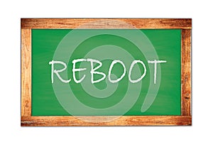 REBOOT text written on green school board