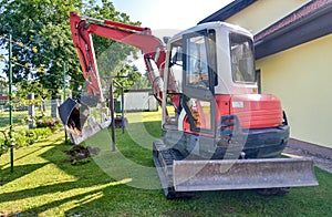 Rebuilding a house and digging dirt with excavator