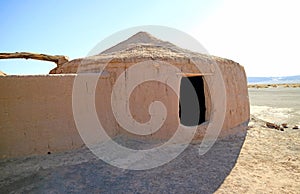 Rebuilt Ancient Circular Mud Huts of Aldea de Tulor Village Complex, San Pedro de Atacama, Antofagasta region of Northern Chile photo