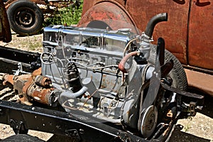 Rebuilt engine mounted on a car chassis