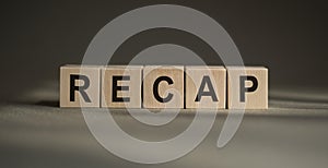 Recap - the word written on wood block