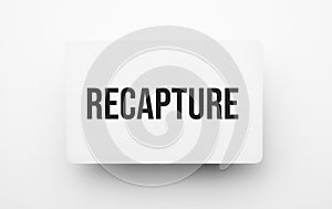recapture sign on notepad on the white backgound