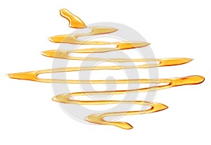 Receding drizzle of honey in zigzag pattern photo