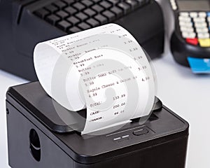 Receipt Printer with paper shopping bill.