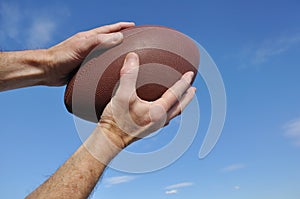 Receiver Catching an American Football Pass