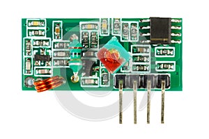 Receiver of digital signal printed circuit board with the set of electronic components isolated on white background