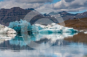 Recently flipped iceberg in JÃ¶kulsÃ¡rlÃ³n, Iceland