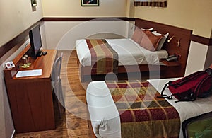 Recently Occupied Hotel Room, Made Up Beds