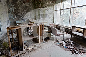 Reception desk in hall of hospital No. 126, abandoned ghost town of Pripyat Chernobyl exclusion zone, Ukraine