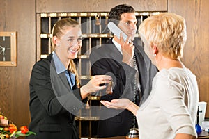 Reception - Guest checking in a hotel