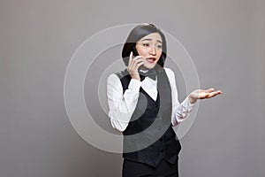 Receptionist answering smartphone call