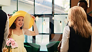 Receptionist greeting guests at hotel