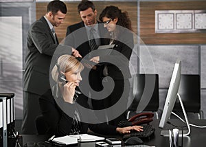 Receptionist talking on headset