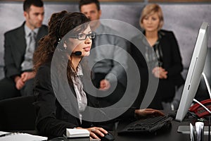 Receptionist talking on headset