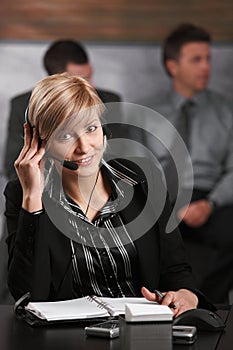 Receptionist talking on phone