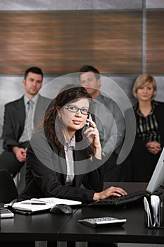 Receptionist talking on phone