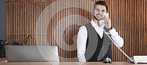 Receptionist talking on phone at desk. Banner design