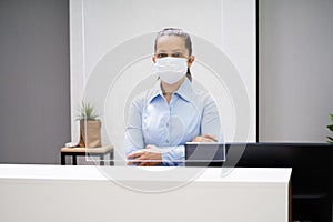 Receptionist Woman At Office Reception