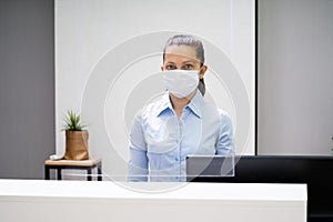 Receptionist Woman At Office Reception