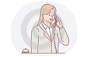 Receptionist woman talking on phone answering customer call with request to send maid or waiter