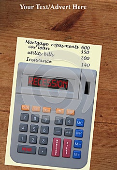 Recession calculator on old pine table