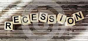 Recession, word written on wooden blocks