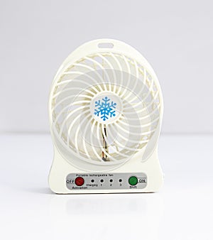 Rechargeable white small fan on white isolated background