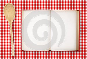 Recipe book on checkered tablecloth