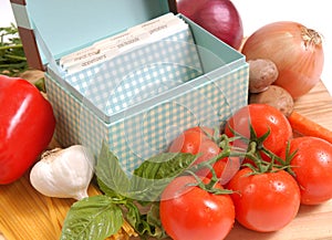 Recipe box with ingredients for spaghetti