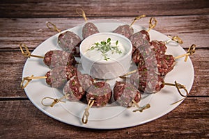 Recipe of kefta, beef skewer, Traditional homemade, with Greek yoghurt sauce, garlic, savory, Arabic and Libanese food