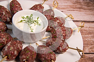 Recipe of kefta, beef skewer, Traditional homemade, with Greek yoghurt sauce, garlic, savory, Arabic and Libanese food