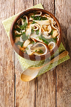 Recipe for Pancake or Crepe Soup Frittaten Suppe close-up in a plate. vertical top view photo