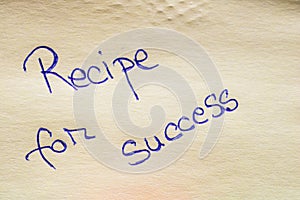 Recipe of success handwriting text close up isolated on yellow paper with copy space